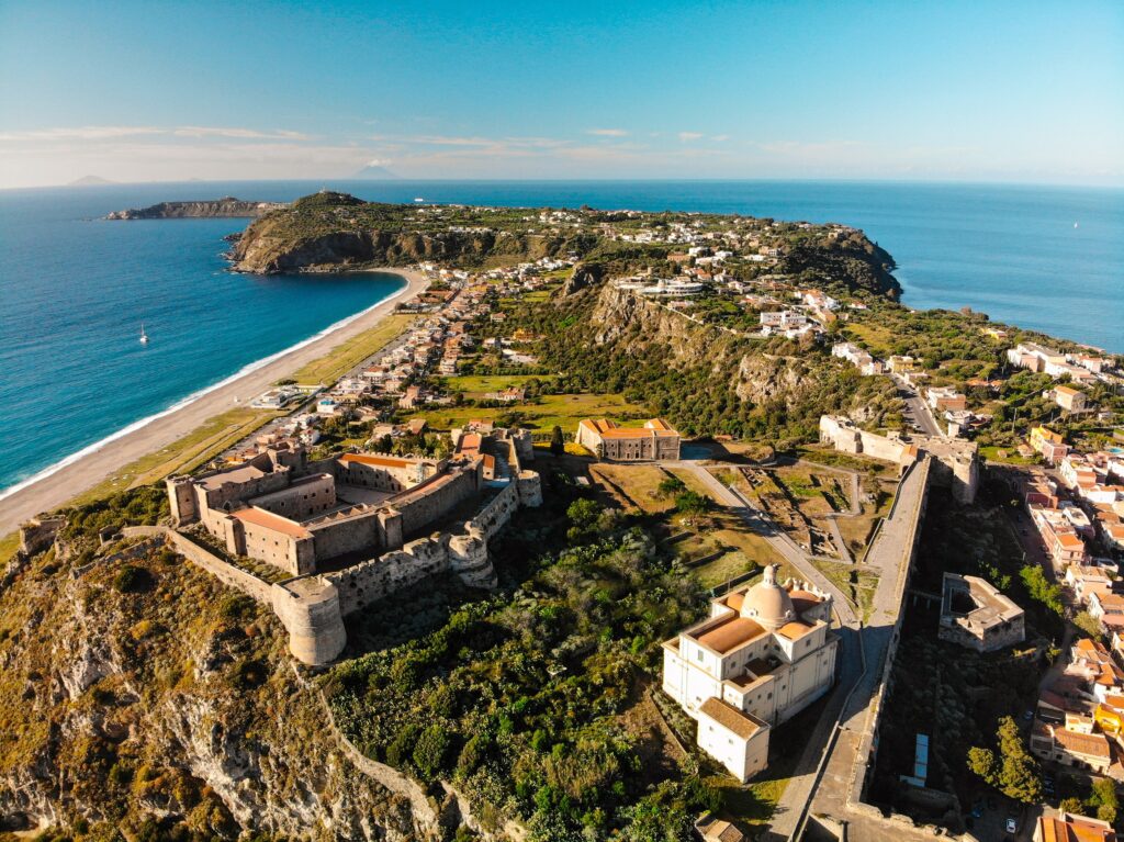 A Sicilian seaside town below its castle